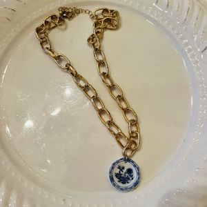 Gold chain necklace with blue chinoiserie plate